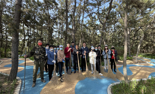 9 山东总公司虎头角营销团队组织发展环保公益活动_副本.jpg